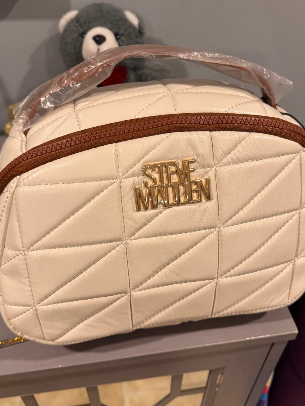 Steve Madden Cream Quilted Crossbody Travel Bag with Brown Trim